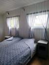 Das Schlafzimmer mit zwei Einzelbetten - diese können zum Doppelbett zusammen gestellt werden.